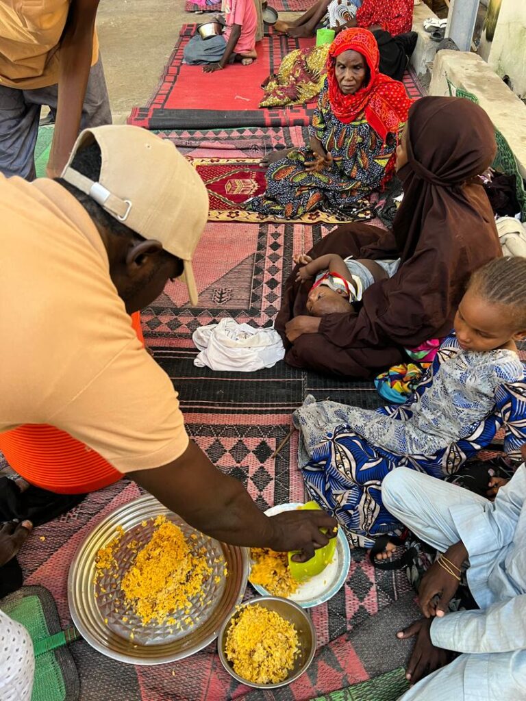 sharing of paliatives by IHUV fOUNDATION at gwaange maiduguri borno state